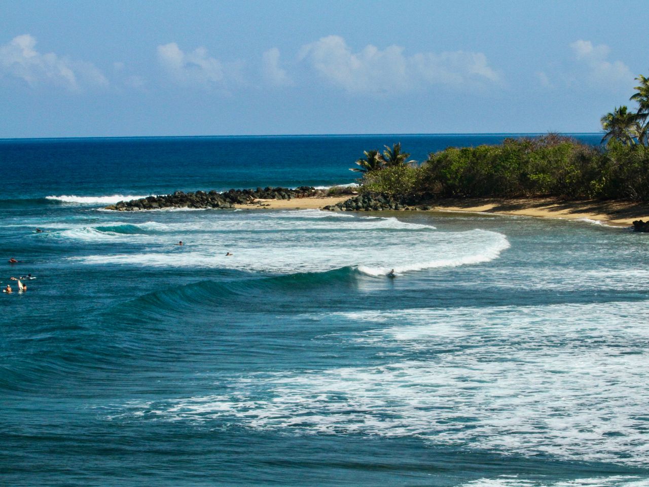 Surfer vor Rincon in Puerto Rico 